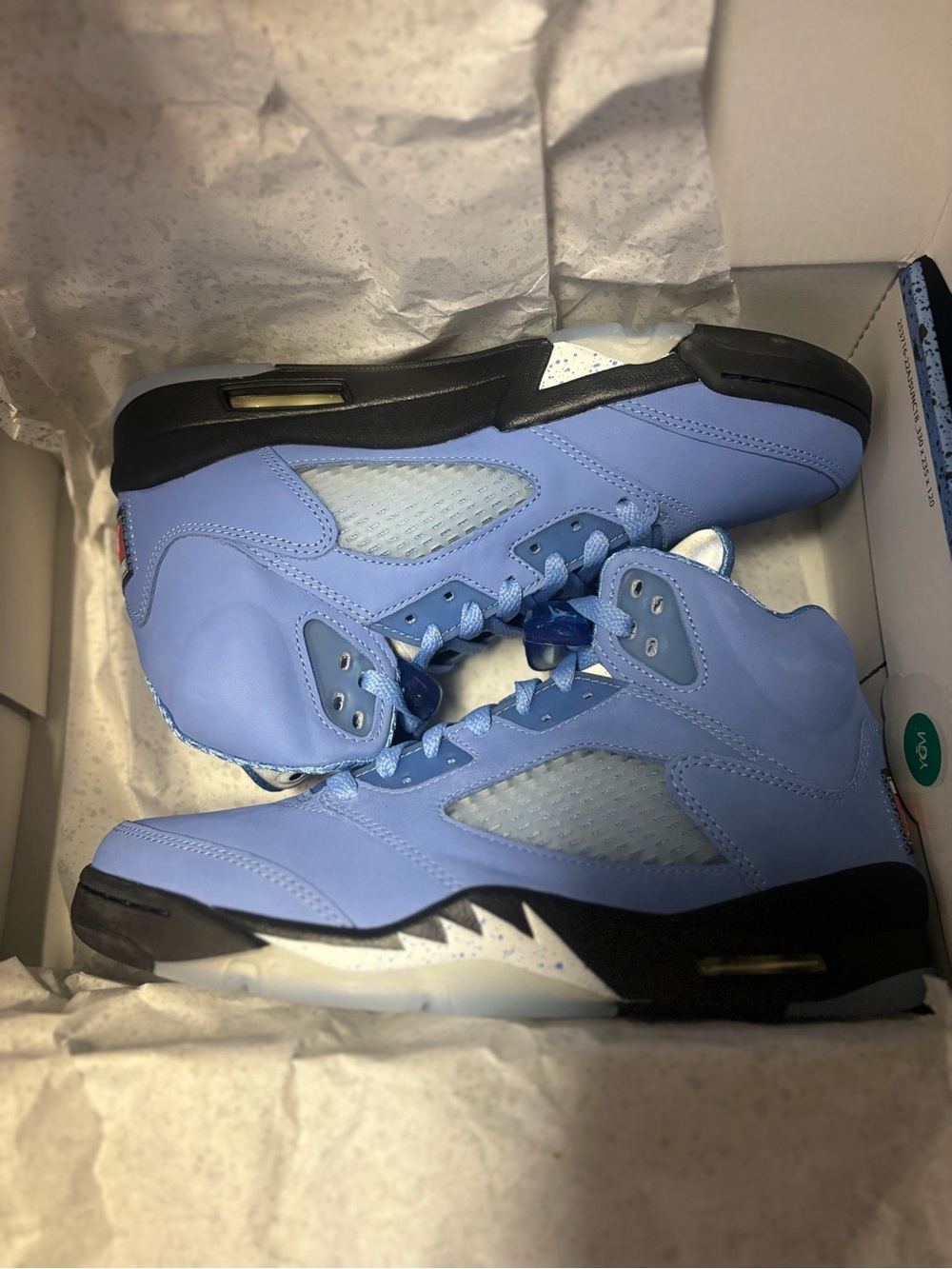 Jordan Retro High Top Sneakers in University Blue and Black